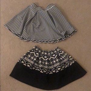 A pair of skirts